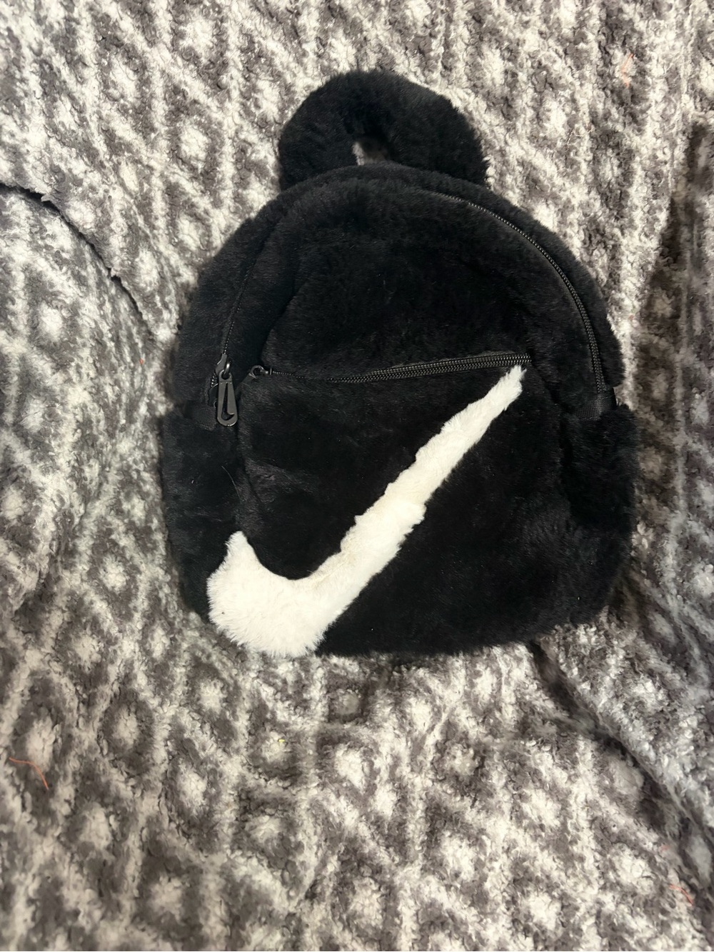 Nike Black Faux Fur Mini Backpack with White Swoosh Accent